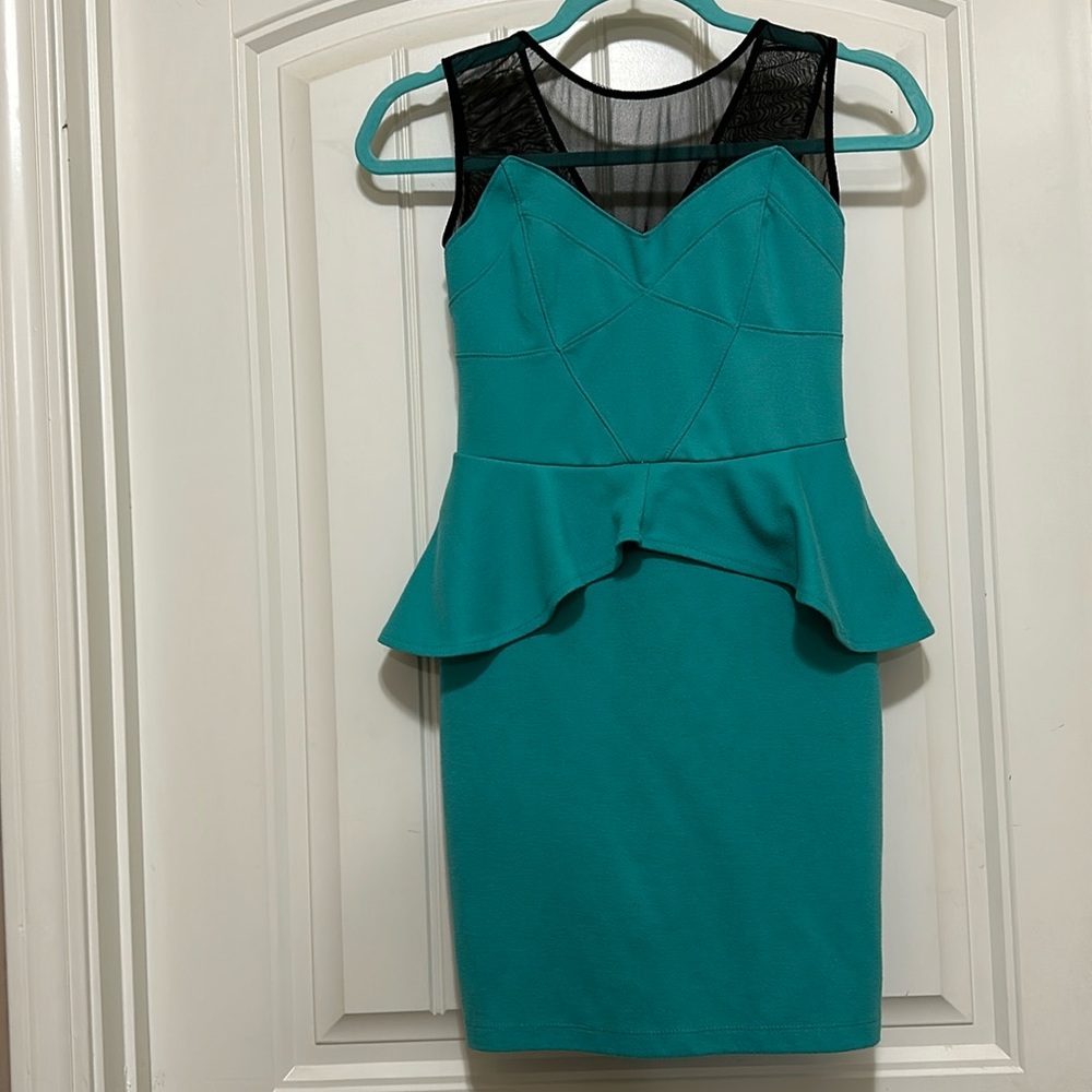 This is a sea green slim dress.Amazing condition!